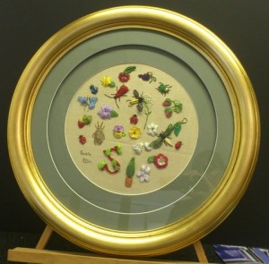 Circular needlework sampler